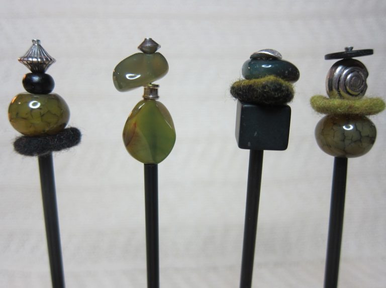 #22 - Ebenholz, Achate, Wollfilz, Altsilber